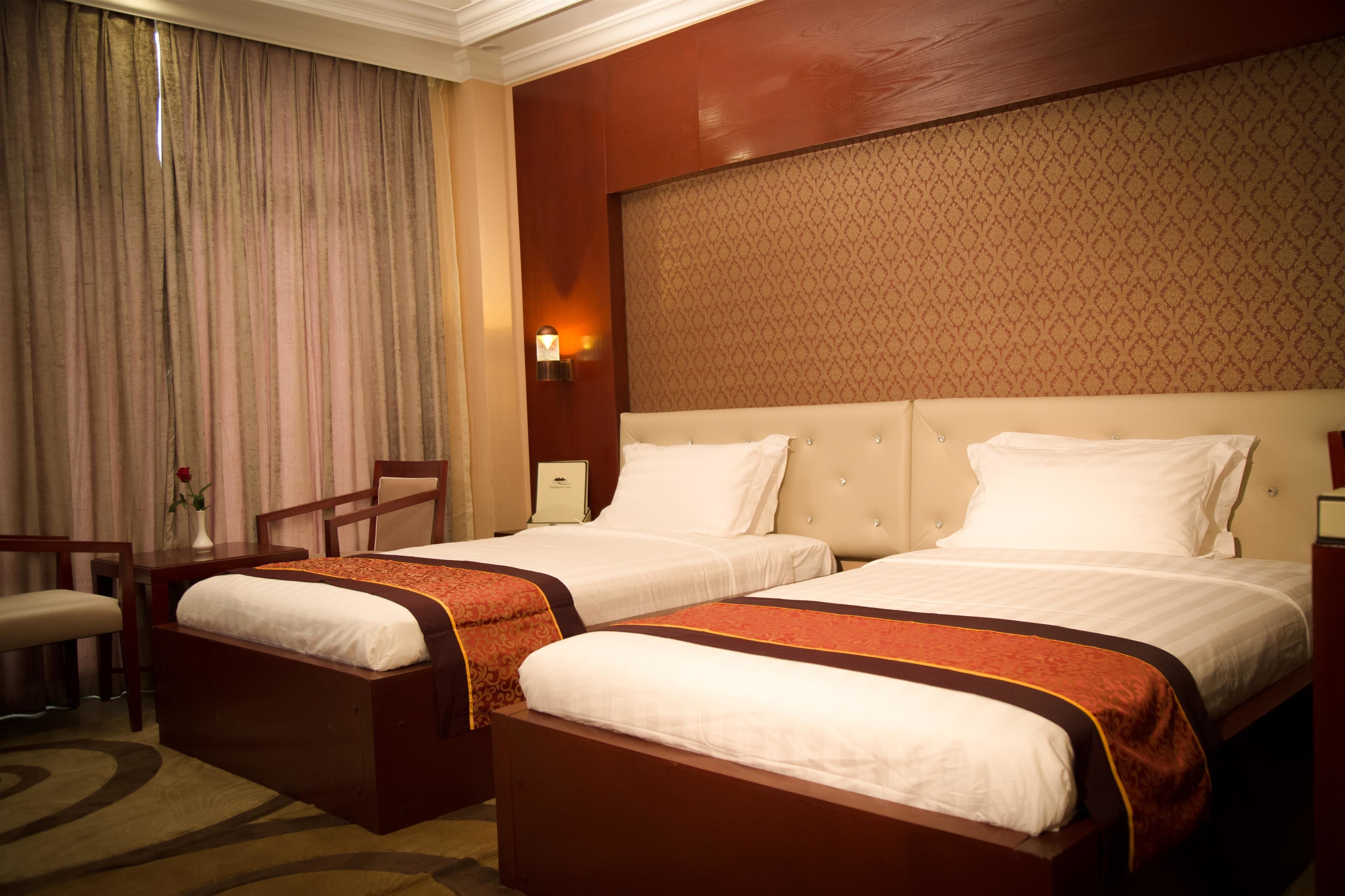 twin room | in-room safe, desk, iron/ironing board, rollaway beds