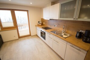 Apartment, 2 Bedrooms, Mountainside | Private kitchen | Fridge, microwave, oven, stovetop