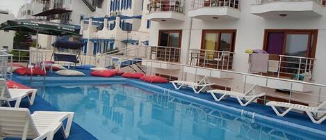 Outdoor pool, pool umbrellas, sun loungers