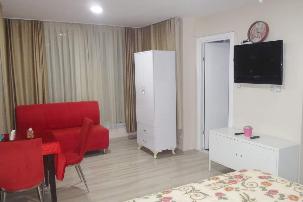 Chambre Triple Deluxe | Coffres-forts dans les chambres, bureau, chambres insonorisées