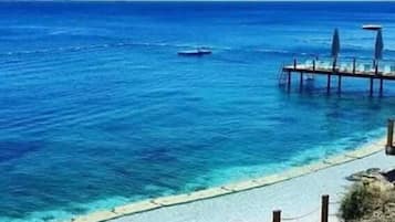 Private beach, sun loungers, beach umbrellas