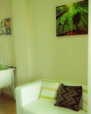 Deluxe Room with Garden View | Sala de estar