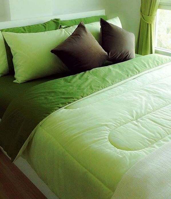 Deluxe Room with Garden View | 1 dormitorio, wifi gratis, ropa de cama