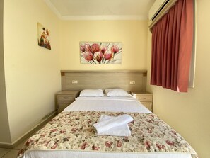 Deluxe Double or Twin Room | Minibar, in-room safe, desk, iron/ironing board