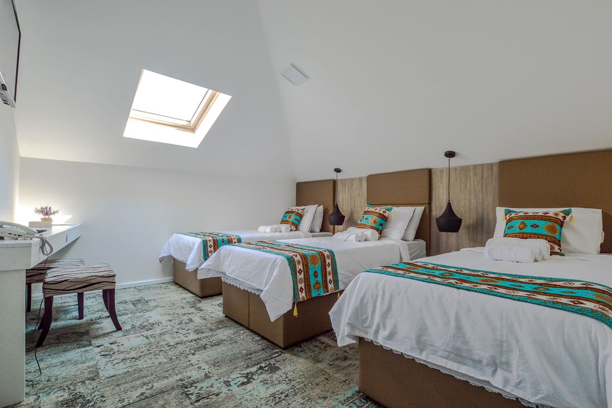 Deluxe Triple Room | Premium bedding, minibar, in-room safe, desk