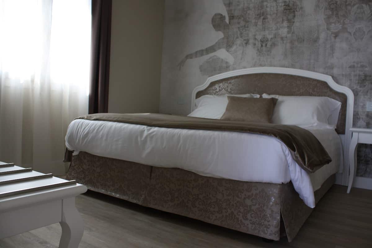Appartement, 1 slaapkamer | 1 slaapkamer, luxe beddengoed, een minibar, een kluis op de kamer