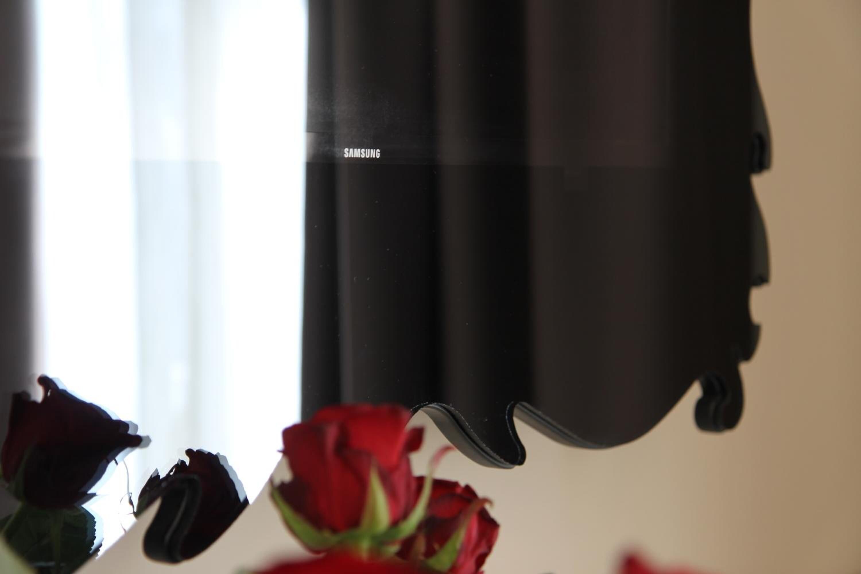 A black object with the word "SAMSUNG" on it.