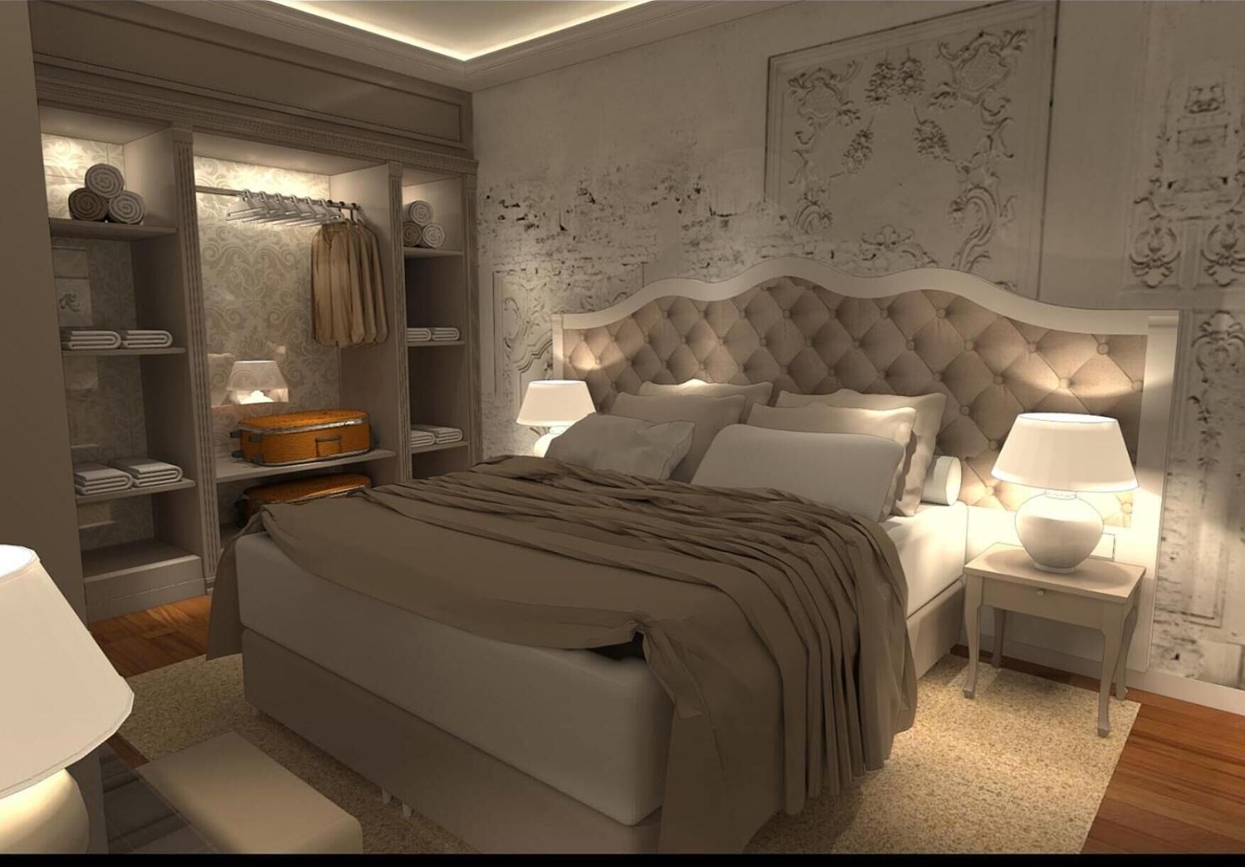 A bedroom with a large bed, two bedside tables with lamps, a wardrobe, and a decorative headboard.