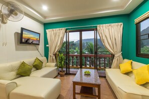 Apartamento (VIP 2) | Zona de estar | Una televisión de pantalla plana