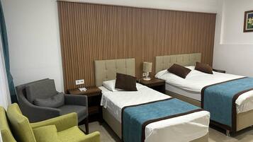 Luxury Triple Room, Sea View | Premium bedding, desk, laptop workspace, soundproofing