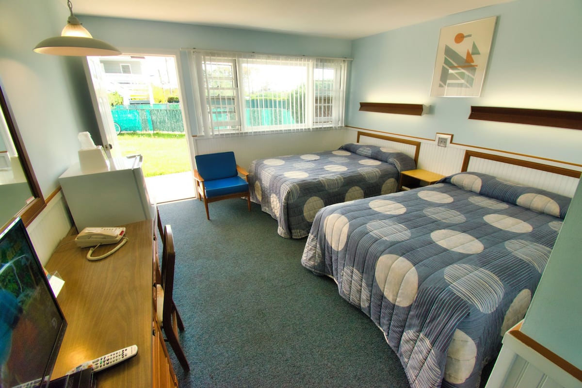 Junior kamer, 2 tweepersoonsbedden | Een strijkplank/strijkijzer, gratis wifi, beddengoed
