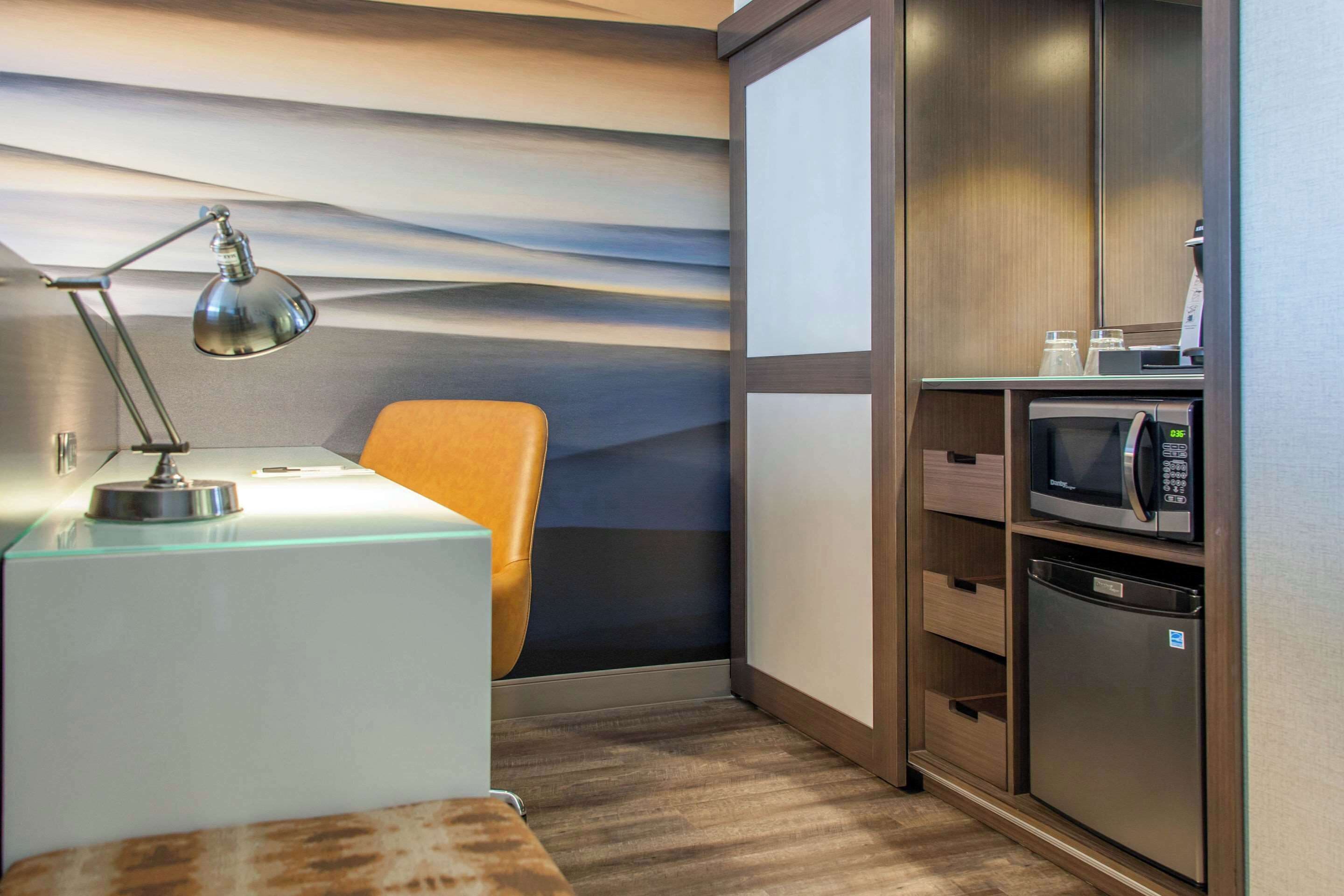 desk, laptop workspace, iron/ironing board, free cots/infant beds