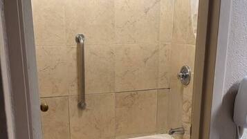 Room, 1 King Bed, Non Smoking | Bathroom | Free toiletries, towels