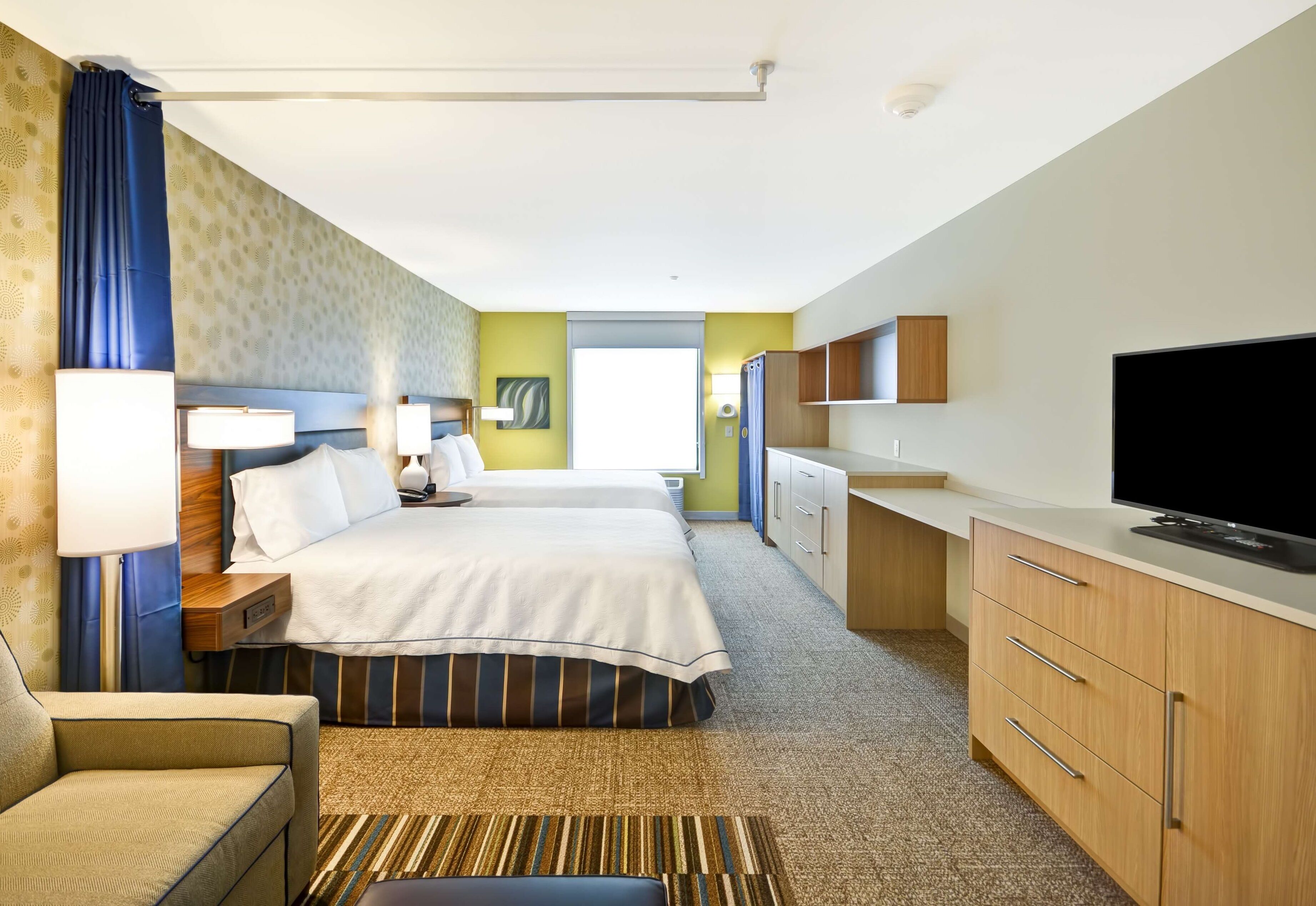 desk, blackout curtains, iron/ironing board, free cots/infant beds