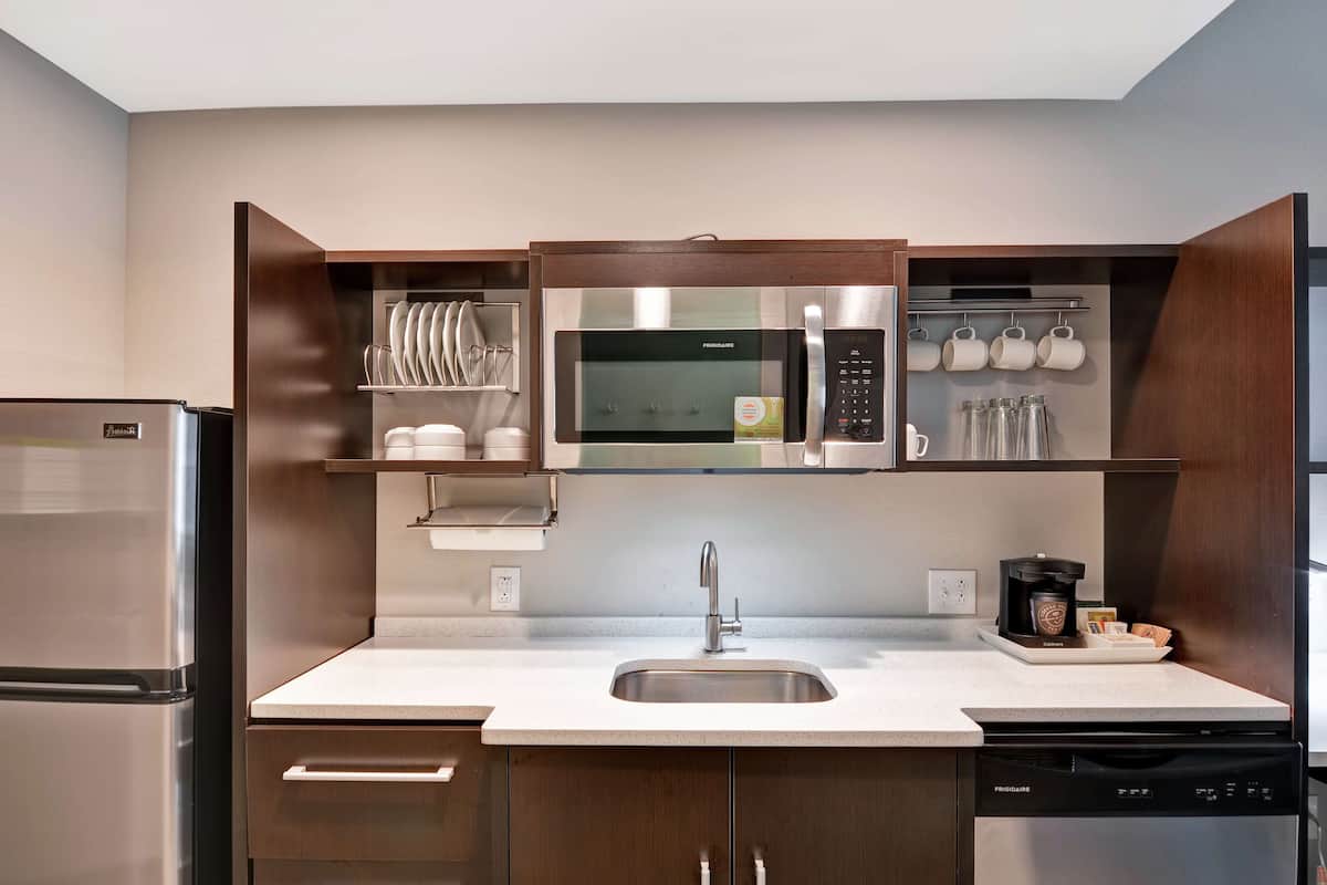 full-sized fridge, microwave, dishwasher, coffee/tea maker