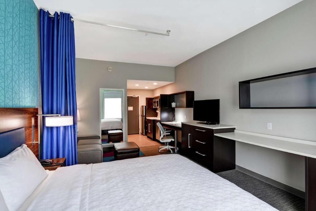 Premium bedding, blackout curtains, iron/ironing board, free WiFi