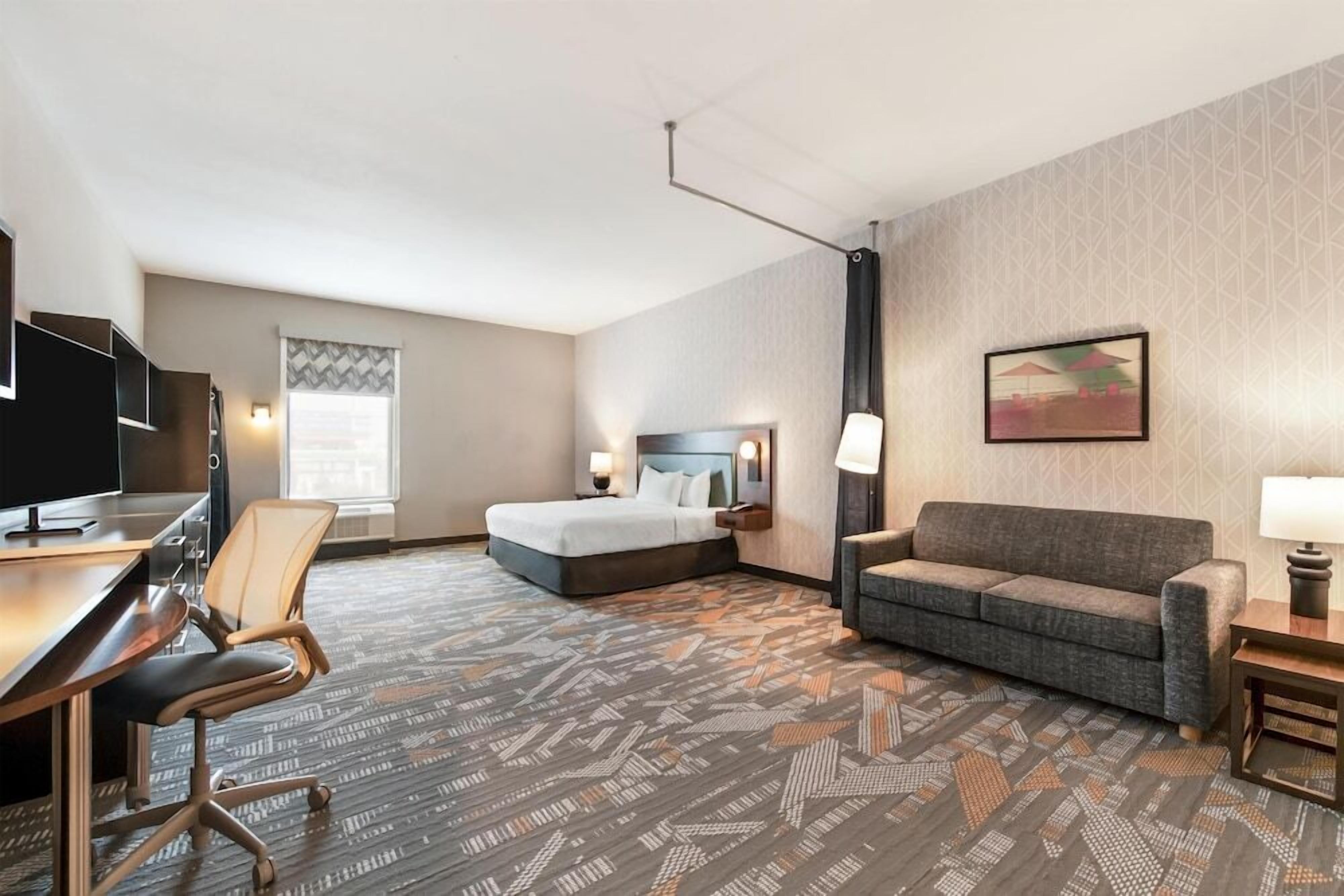 Premium bedding, blackout curtains, iron/ironing board, free WiFi
