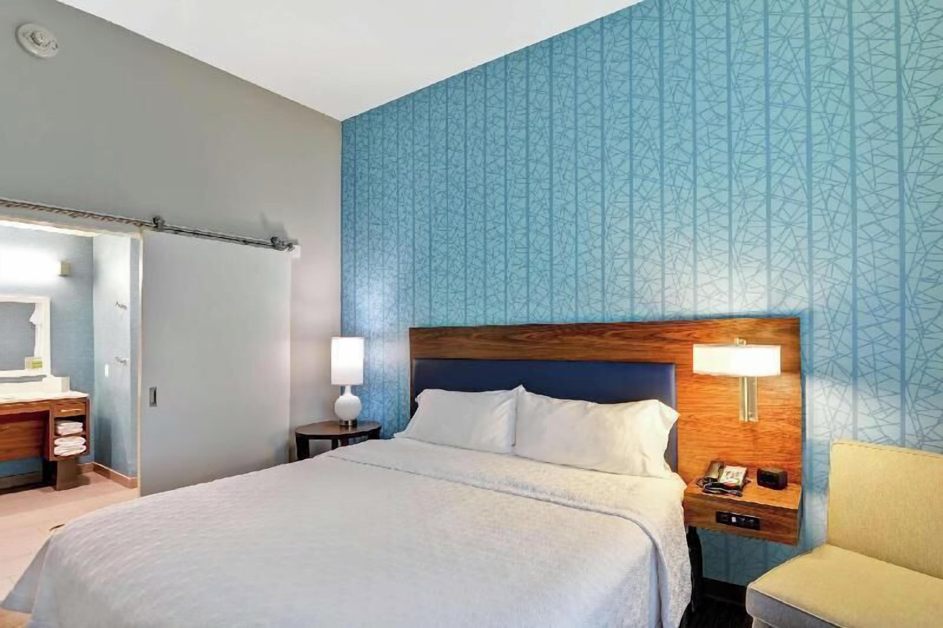 Premium bedding, blackout curtains, iron/ironing board, free WiFi