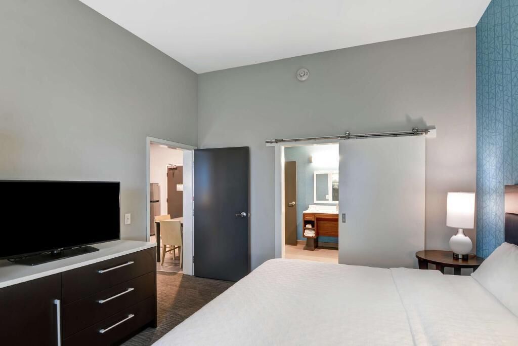 Premium bedding, blackout curtains, iron/ironing board, free WiFi