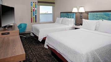 Premium bedding, in-room safe, blackout drapes, free cribs/infant beds
