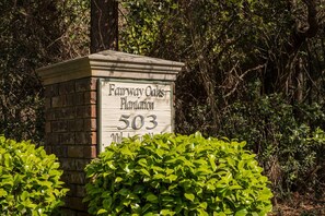 Welcome to Fairway Oaks Plantation 503, a serene retreat surrounded by lush greenery.