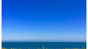 PĂ„ stranden och strandhanddukar