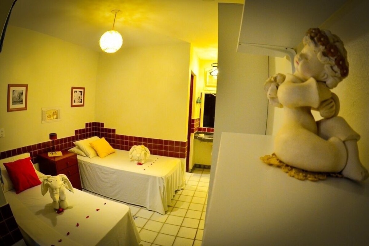 Minibar, iron/ironing board (on request), WiFi (free), bed sheets