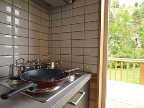 Fridge, microwave, stovetop, coffee/tea maker