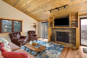 Flat-screen TV, fireplace