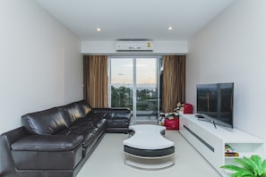 Studio, 2 Bedrooms | In-room safe, desk, blackout drapes, iron/ironing board