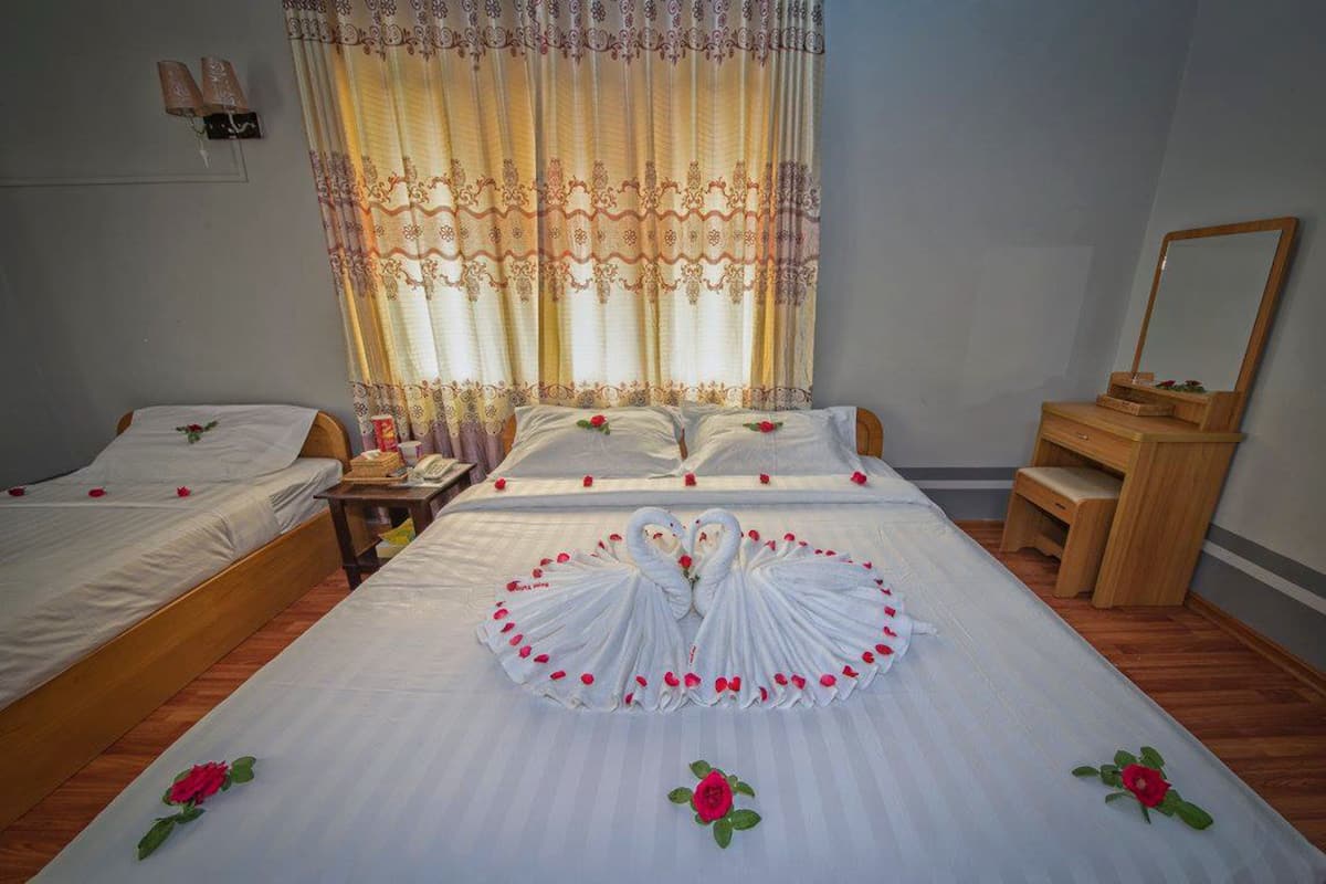 Family Room | Minibar, in-room safe, desk, WiFi (free)