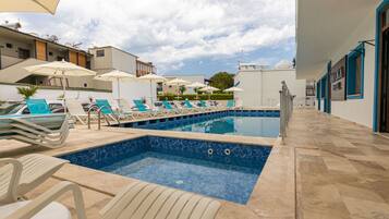 Outdoor pool, pool umbrellas, pool loungers