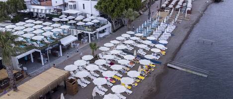 Private beach, white sand, free beach shuttle, sun loungers