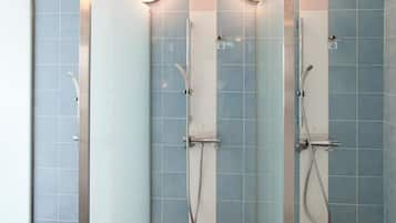 Combined shower/tub, free toiletries, hair dryer, slippers