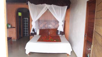 Double Room, Garden View | Cots/infant beds