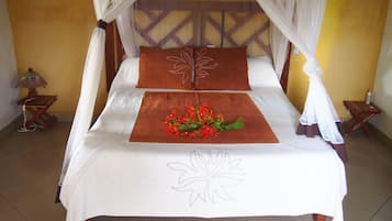Habitación doble, vistas al jardín | Cunas (de pago)