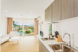 Estudio, 1 habitación | 1 habitación, caja de seguridad en la habitación y cortinas blackout 