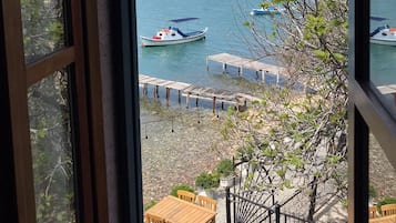 Standard Room, Partial Sea View | In-room safe, desk, free WiFi, bed sheets