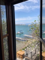 Standard Room, Partial Sea View | In-room safe, desk, WiFi (free), bed sheets