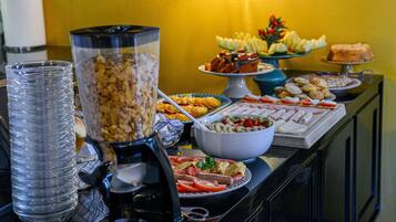 Daily buffet breakfast (EUR 15 per person)