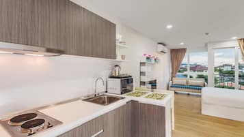 Standard Condo, 1 Bedroom | Private kitchen | Fridge, microwave, stovetop, electric kettle