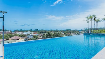 Outdoor pool, pool umbrellas, pool loungers