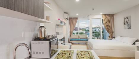 Standard Condo, 1 Bedroom | 1 bedroom, in-room safe, iron/ironing board, free WiFi