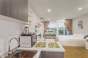 Appartamento Standard, 1 camera da letto | 1 camera, una cassaforte in camera, ferro/asse da stiro, Wi-Fi gratuito