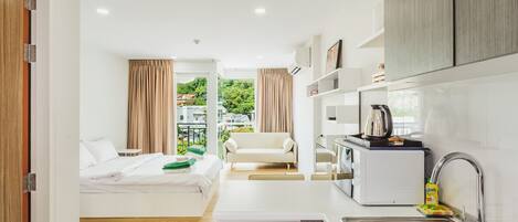 Condo, 1 Bedroom | 1 bedroom, in-room safe, blackout drapes, iron/ironing board