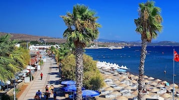 Private beach, sun loungers, beach umbrellas