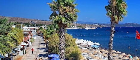 Private beach, sun loungers, beach umbrellas