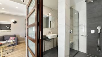Luxury Suite, Balcony | Bathroom | Shower, free toiletries, hair dryer, towels
