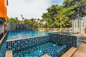 Outdoor pool, pool umbrellas, sun loungers