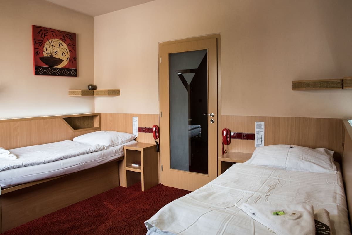 Desk, blackout curtains, free WiFi, bed sheets